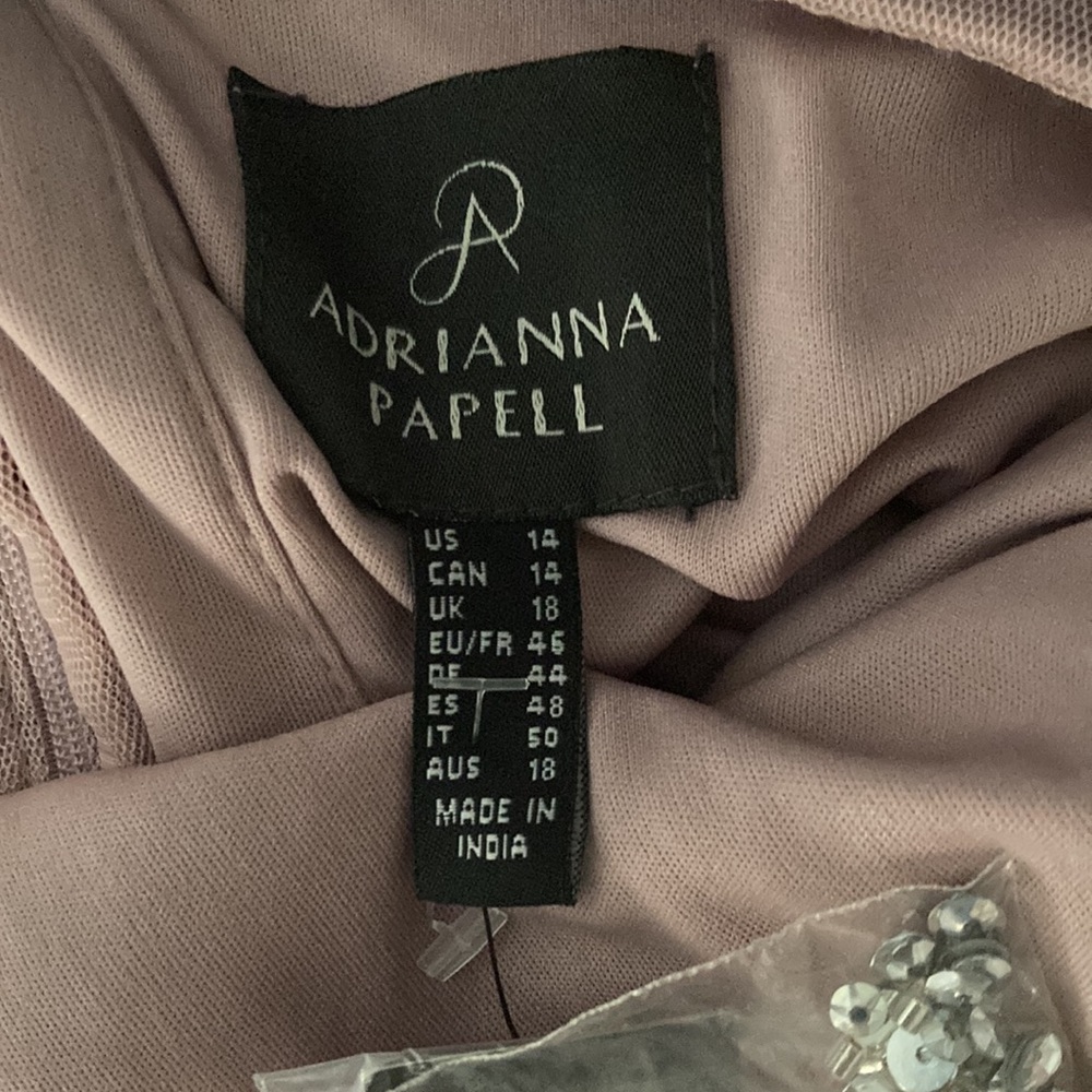 I am selling this Adrianna Papell dress.Never worn still with tags on.